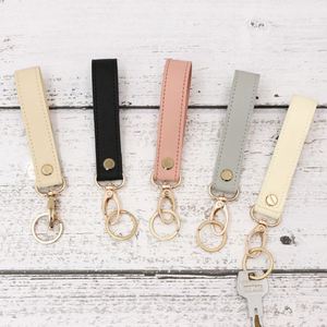 Stocked Premium PU Leather Wrist Strap Keychain Portable Car Key Holder Metal Keyring Promotional Business <b>Gifts</b> - Product Image 2