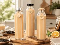 Échantillon gratuit 150ml/250ml/280ml/350ml/400ml/500ml Bouteille en verre carrée transparente pour jus de fruits avec bouchon à vis hermétique