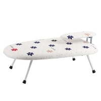 Table de fer résistante à la chaleur de planche à repasser pliable réglable en hauteur noire pour la blanchisserie de chemise de vêtements