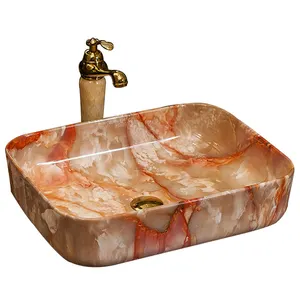 Lavandino in marmo Calacatta da bagno in ceramica a basso prezzo vendita calda sopra il lavabo in marmo da bagno in ceramica da appoggio