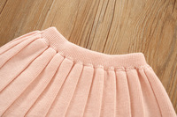 Ventes en gros de ensembles de jupe et de pull en tricot pour filles, doux, décontractés, deux pièces, écologiques, manches longues, automne-hiver, vêtements pour enfants