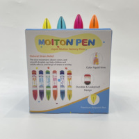 Stylo bille en gros en forme de balle avec minuterie liquide, points colorés à effet de goutte d'huile, jouet anti-stress relaxant, décoration de bureau, boîte PDQ personnalisée
