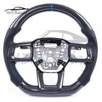 Vente en gros d'accessoires pour Ford Mustang S650, volant en fibre de carbone avec surpiqûres bleues et garniture de boutons, 2024 et plus