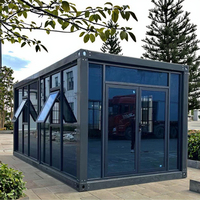 Sortie d'usine 40ft Maison conteneur modulaire en acier Panneau sandwich de style méditerranéen Bureau mobile Cour extérieure Utilisation d'un magasin