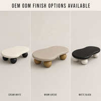 Table basse élégante et luxueuse de style nordique minimaliste, mini, unique, couleur crème, avec base en boule noire