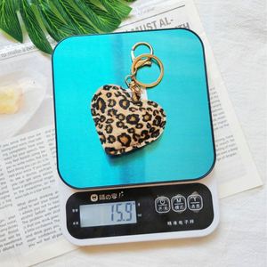 Best-Selling Leopard Print Heart-Shaped Alloy Plated Digital Printing Peach <b>Car</b> Pendant Bag Decoration Keychain - Product Image 4