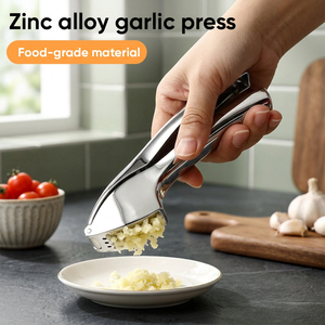 Presse-ail en alliage de zinc personnalisée, presse-ail manuelle multifonctionnelle pour la cuisine, la maison et les restaurants - Product Image 1