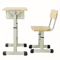 Ensemble chaise et pupitre moderne pour salle de classe avec panier sous le bureau, patère à vêtements, structure métallique, finition imitation bois, pour élèves du primaire et utilisation en parc