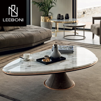 Table basse à plateau en marbre de forme spéciale postmoderne base en acier inoxydable en cuir de velours table basse nordique