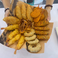 Approvisionnement en gros de fruits de mer halal frits et croustillants, préparés et panés, prêts à consommer pour la distribution B2B aux services de restauration