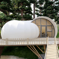 Tente de glamping en forme de coquille d'escargot pour l'extérieur, avec structure en acier et porte en verre, pour villa de vacances