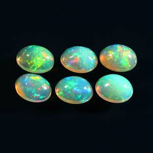 อัญมณีทรงวงรีสีเหลืองธรรมชาติทรงโอปอลอัญมณีทรงหลวมจากเอธิโอเปียนผลิตจากความร้อน - Product Image 1