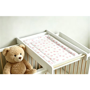 Superbe surface de change de couche pour bébé, facile à entretenir, offrant un support stable et souple pour les nouveau-nés lors du remplacement de la couche. - Product Image 1