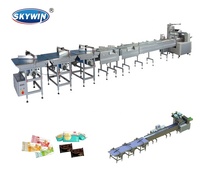 Nouvelle machine d'emballage automatique Skywin avec poussoir en acier inoxydable pour la fabrication de biscuits gaufrettes à base de farine pour boulangerie