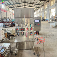 Machine de remplissage de boissons semi-automatique à 4 têtes fournie par le chinois équipement de remplissage quantitatif auto-fluide réglable