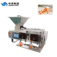 Machine de comptage et de remplissage semi-automatique électronique pour bonbons, chewing-gums et chocolats