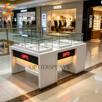 Comptoir de présentation optique moderne blanc sur mesure, vitrine de luxe en verre trempé pour lunettes