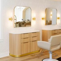 Station de coiffure de luxe sur mesure avec miroir double face arqué ovale incurvé et éclairage LED, avec table intégrée