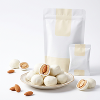Dattes rouges fourrées aux amandes de marque privée, enrobées d'un glaçage crémeux au lait, collations saines aux noix