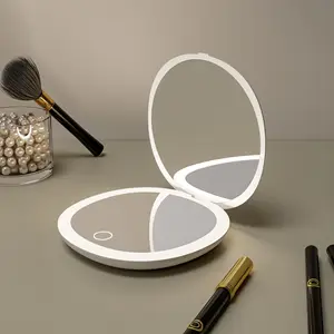 Travel lipat genggam portabel Makeup kosmetik kustom Logo Mini kecil saku cermin kompak dengan lampu Led