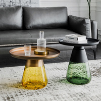 Table basse de rangement moderne avec socle en verre rond et petite table d'appoint de salon en verre