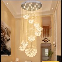 Lustre en cristal moderne K9 grand escalier de luxe suspendu E14 LED pour la décoration du hall d'hôtel Installation de projet en acier