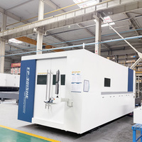 Machine de découpe laser à fibre CNC en tôle métallique fermée FINCM haute puissance 12000w 20000w 30000w 3015 12kw 20kw avec plateforme d'échange