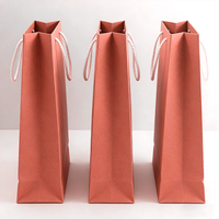 Sacs de courses en papier d'art de qualité supérieure, écologiques et recyclables, avec impression flexo pour les expositions et emballages cadeaux personnalisables