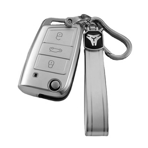 Funda para llave de coche personalizada TPU con arena movediza plateada apta para <span class=keywords><strong>VW</strong></span> Golf PoloTiguan Passat Caddy, funda para llave plegable automática, bolsa remota Fob - Product Image 1