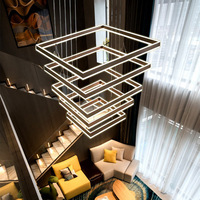 Lustre d'escalier doré noir de luxe moderne LED anneau suspension lampe suspendue lustre décoratif en aluminium