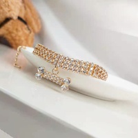 Collier Classique Hip-hop pour Animaux de Compagnie du Fabricant avec Strass et Motif Os, Chaîne pour Chiens et Chats Toutes Saisons