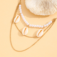 Chaîne de bras à 3 couches avec coquillages cauris et perles, chaîne dorée à pendentif, bijoux de plage superposés, cadeau pour femme