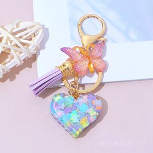 พวงกุญแจเรซิ่นรูปหัวใจคริสตัล ประดับพู่ห้อยผีเสื้อสุดหรู พวงกุญแจรูปหัวใจ จี้ห้อยกระเป๋าสำหรับ<span class=keywords><strong>สาว</strong></span>ๆ จี้ห้อยกุญแจรถ เครื่องประดั<span class=keywords><strong>บ</strong></span> - Product Image 2