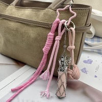 Pendentif en corde tressée tendance, porte-clés innovant en acier inoxydable, sac à rouge à lèvres en maille, petit pendentif boule, vente en gros