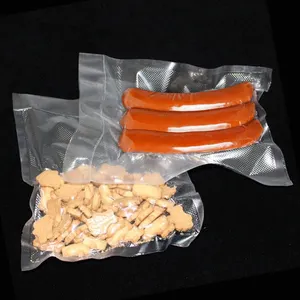 जमे हुए खाद्य पदार्थों के लिए खाद्य ग्रेड एक तरफ उभरा हुआ पारदर्शी नायलॉन वैक्यूम रोल फ्लिम हीट सील वैक्यूम सीलर बैग वैक्यूम पाउच