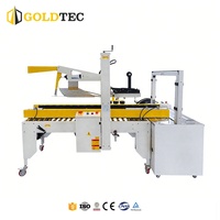 Système d'emballage robuste Goldtec : Scelleuse automatique de caisses pliantes et cerclage pour machines d'emballage de boîtes
