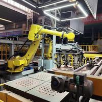 Robot industriel FANUC R-2000iC/210F 165F à 6 axes pour la manutention de disques de frein, de moyeux de roue, la palettisation et l'asservissement des machines