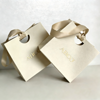 Sac en papier d'emballage cadeau de luxe personnalisé avec logo imprimé, respectueux de l'environnement, pour bijoux, cosmétiques, bougies, parfums, boutiques