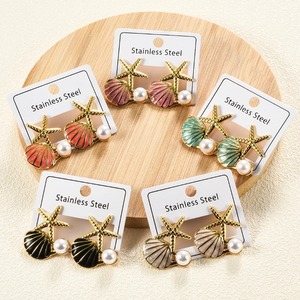 1 paire de boucles d'oreilles en acier inoxydable en forme d'étoile de mer et de coquillage, tendance, colorées, style océan, pour l'été et la plage, pour femmes et filles - Product Image 1
