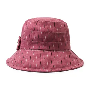 Vente en gros de chapeau populaire en tissu de loisirs chapeau de pêcheur imprimé en coton avec décoration florale pour chapeau de dame