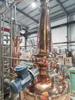 Colonne de distillation semi-automatique 200L hybride en cuivre avec colonne de reflux en verre pour la production industrielle de vodka, gin et whisky