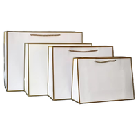 Emballage de vêtements de luxe imprimé sur mesure Cadeaux au détail Sacs cadeaux haut de gamme en papier kraft blanc