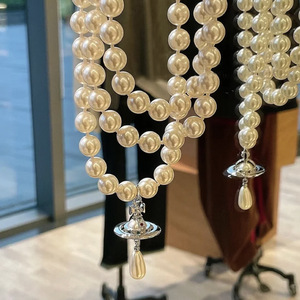 Collar Saturno Estilo Punk Empress Dowager, Cadena de Aleación de Lujo para Banquete, Diseño de Gota de Agua Tridimensional de Tres Capas - Product Image 2