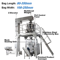 Machine d'emballage industrielle VFFS automatique multi-têtes pour sachets de produits alimentaires solides (noix, bonbons, chips de plantain, biscuits)