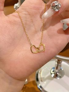 Collier pendentif double cœur en or 18 carats Xinfly, bijoux élégants et raffinés, cadeau idéal pour la Saint-Valentin, un anniversaire, en promotion - Product Image 3