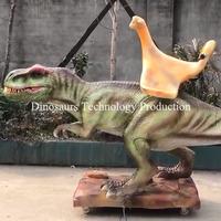 Équipement interactif de balade à cheval sur dinosaure à vendre ou balade animatronique T-Rex pour enfants pour parcs à thème, pour un divertissement aventureux