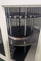 Machine de remplissage de poudre pour caloducs destinée aux systèmes de gestion thermique