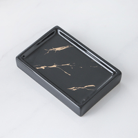 Elégant ensemble d'accessoires de salle de bain en marbre noir pour hôtel ou maison distributeur de savon en céramique porte-brosse à dents et plateau