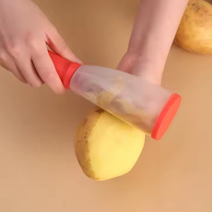 Gadget de cuisine manuel 2-en-1 pratique <span class=keywords><strong>pour</strong></span> éplucher les légumes et les fruits Boîte de rangement en PP <span class=keywords><strong>pour</strong></span> pommes de terre, <span class=keywords><strong>carottes</strong></span> et autres râpes Coupeur de pelage - Product Image 4