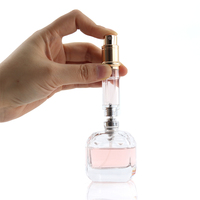 Atomiseur de bouteille de parfum rechargeable en cuir coloré de taille de poche de qualité supérieure